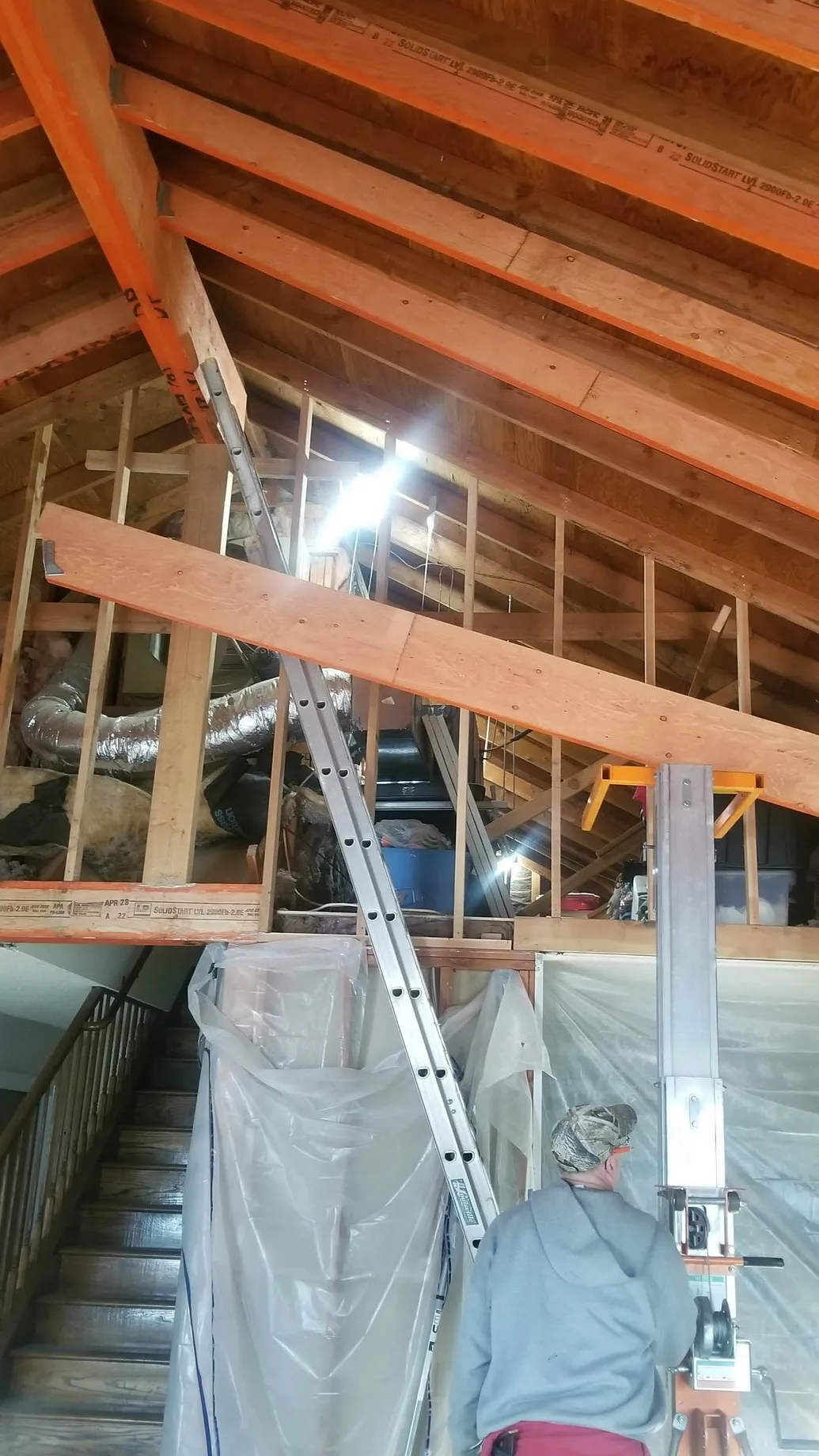 Exposed rafters and shoring where a load path was carried during a CCI Builders repair